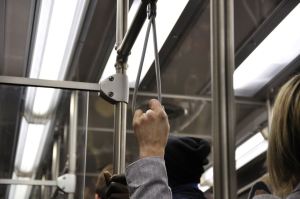 Bus grab handle passenger assist strap