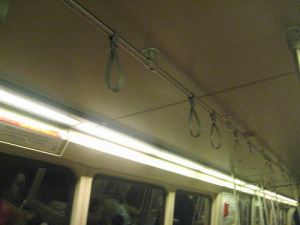 Another example of a centre mount configuration for passengers straps on a subway